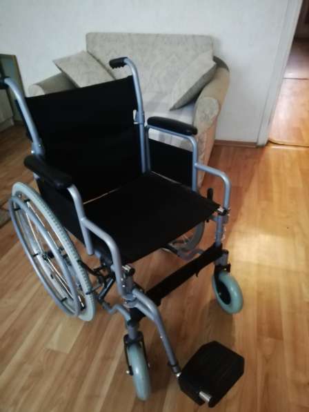 Продам инвалидное кресло коляску новую