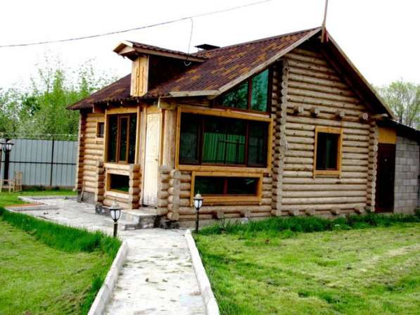 Срубы домов, бань из оцилиндрованного бревна в Омске