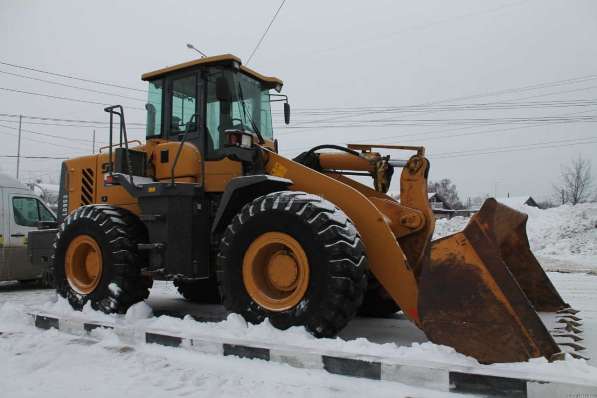 Аренда трактора погрузчика. Уборка чистка и вывоз снега в Екатеринбурге фото 19