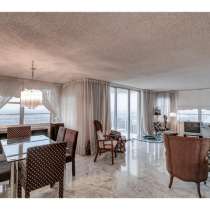 Просторная угловая квартира в современном жилом комплексе, в г.Aventura